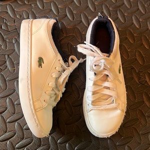 White w/Navy Blue Lacoste boys sneakers. Size us13